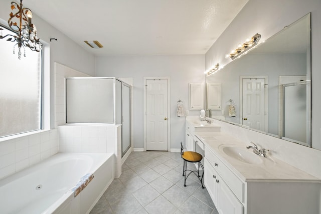 3207 Summerwind Ct, Pearland, TX 77584 - full bathroom featuring double vanity, a stall shower, a garden tub, and tile patterned flooring