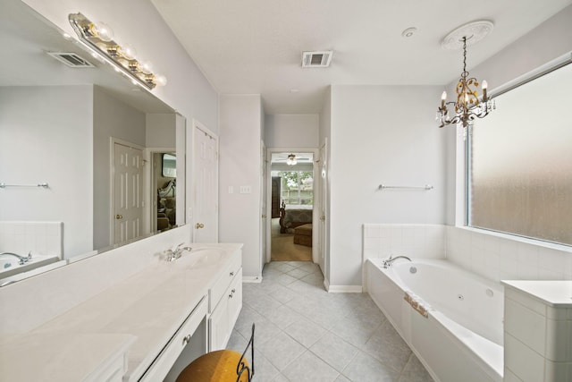3207 Summerwind Ct, Pearland, TX 77584 - full bath featuring ensuite bathroom, vanity, a whirlpool tub, tile patterned flooring, and a chandelier