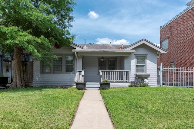 2027 Huldy St, Houston, TX 77019 - bungalow-style house with covered porch and a shingled roof