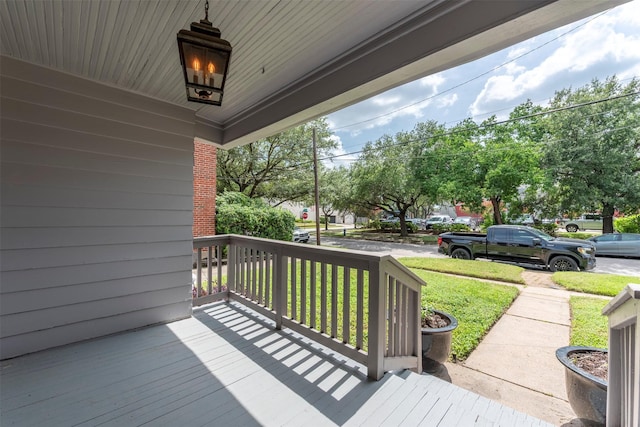 2027 Huldy St, Houston, TX 77019 - wooden porch with a yard