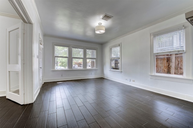 2027 Huldy St, Houston, TX 77019 - empty room featuring crown molding and dark wood-style flooring