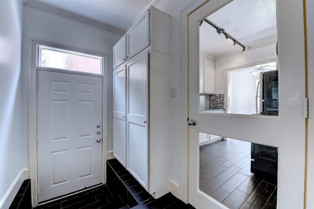 2027 Huldy St, Houston, TX 77019 - foyer entrance featuring track lighting and ornamental molding
