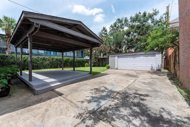 2027 Huldy St, Houston, TX 77019 - view of vehicle parking with a detached garage