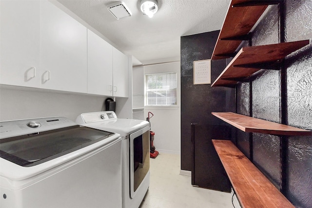 17214 Palm Falls Ct, Houston, TX 77095 - washroom featuring light flooring, washing machine and clothes dryer, and cabinet space