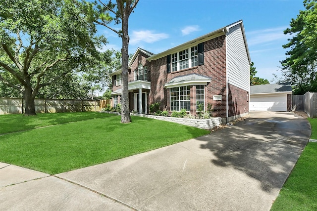 17214 Palm Falls Ct, Houston, TX 77095 - view of front of home featuring brick siding, an outbuilding, and a detached garage