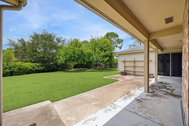 1003 Kemberton Dr, Houston, TX 77062 - view of yard with a patio, a garage, and driveway