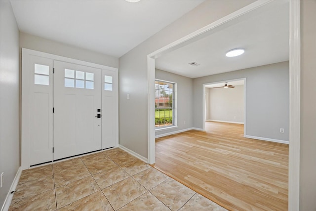 1003 Kemberton Dr, Houston, TX 77062 - entryway featuring baseboards and light wood-style flooring