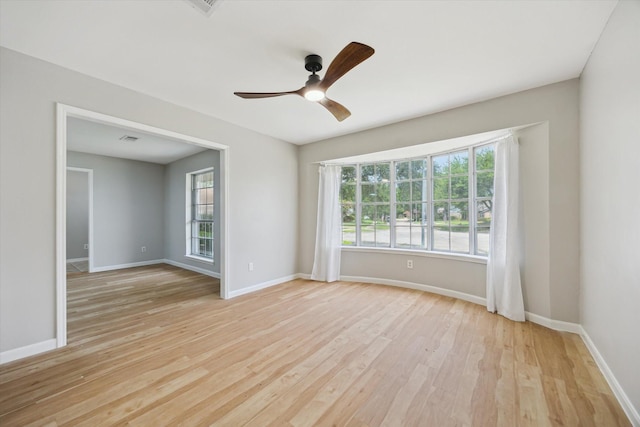 1003 Kemberton Dr, Houston, TX 77062 - unfurnished room featuring light wood-style floors and ceiling fan