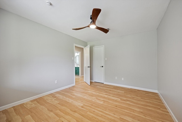 1003 Kemberton Dr, Houston, TX 77062 - empty room featuring light wood-type flooring, ceiling fan, and a smoke detector