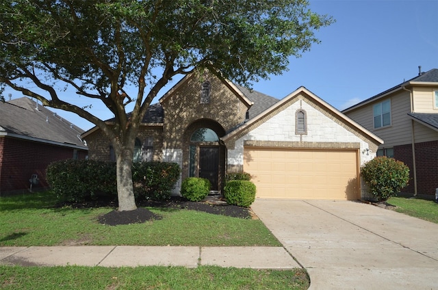 21514 Colton Cove Dr, Houston, TX 77095 - view of front facade with a garage, driveway, a front yard, brick siding, and a shingled roof