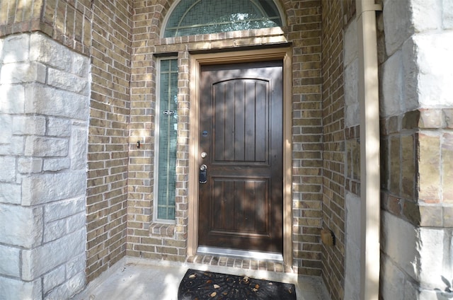 21514 Colton Cove Dr, Houston, TX 77095 - doorway to property with brick siding