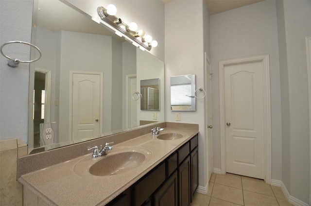 21514 Colton Cove Dr, Houston, TX 77095 - bathroom featuring double vanity and tile patterned flooring