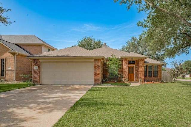 21619 Oakcreek Ct, Katy, TX 77450 - view of front of home featuring an attached garage, concrete driveway, brick siding, a front yard, and a chimney