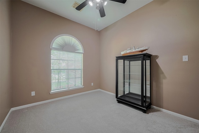 21619 Oakcreek Ct, Katy, TX 77450 - spare room with carpet floors, a ceiling fan, and lofted ceiling