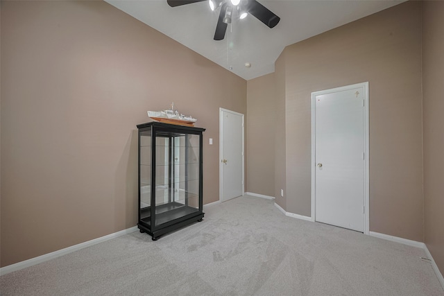 21619 Oakcreek Ct, Katy, TX 77450 - unfurnished bedroom featuring carpet, high vaulted ceiling, and ceiling fan