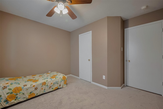 21619 Oakcreek Ct, Katy, TX 77450 - bedroom with carpet flooring and ceiling fan