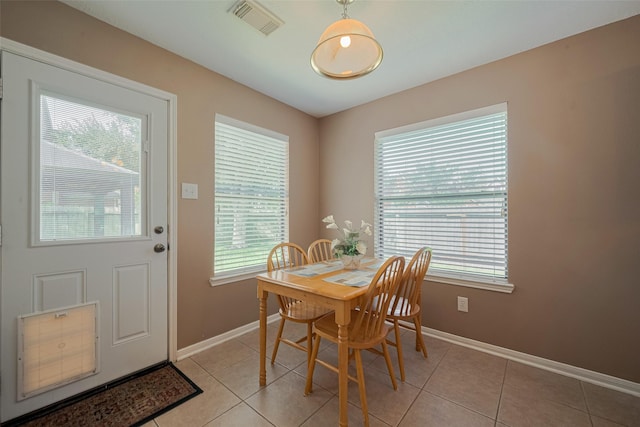 21619 Oakcreek Ct, Katy, TX 77450 - dining room with healthy amount of natural light and light tile patterned floors
