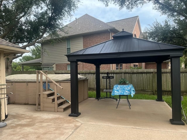 21619 Oakcreek Ct, Katy, TX 77450 - view of patio featuring a hot tub and a gazebo