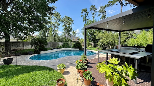 8110 Hideaway Run Way, Spring, TX 77389 - view of pool featuring a wooden deck and a fenced backyard