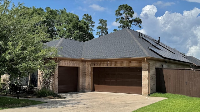 8110 Hideaway Run Way, Spring, TX 77389 - view of side of property featuring a shingled roof, a garage, driveway, and brick siding
