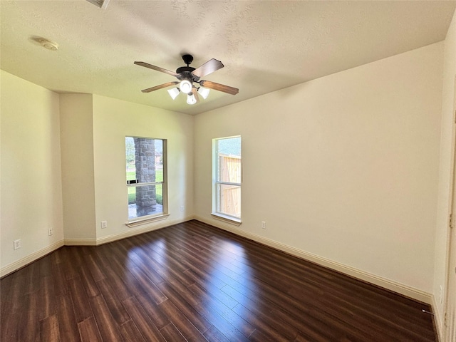 8110 Hideaway Run Way, Spring, TX 77389 - spare room with ceiling fan, dark wood finished floors, and a textured ceiling