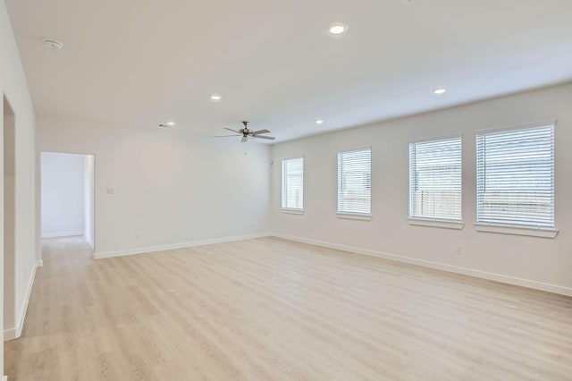 19367 Poppy Village Cir, Magnolia, TX 77355 - empty room with a smoke detector, light wood-style flooring, ceiling fan, and recessed lighting