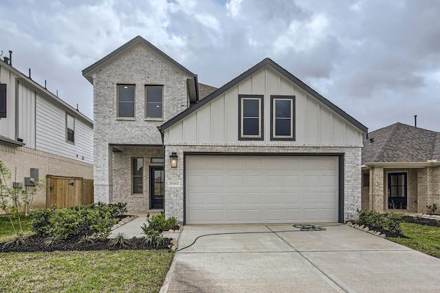 19367 Poppy Village Cir, Magnolia, TX 77355 - view of front of home with board and batten siding, driveway, and a garage