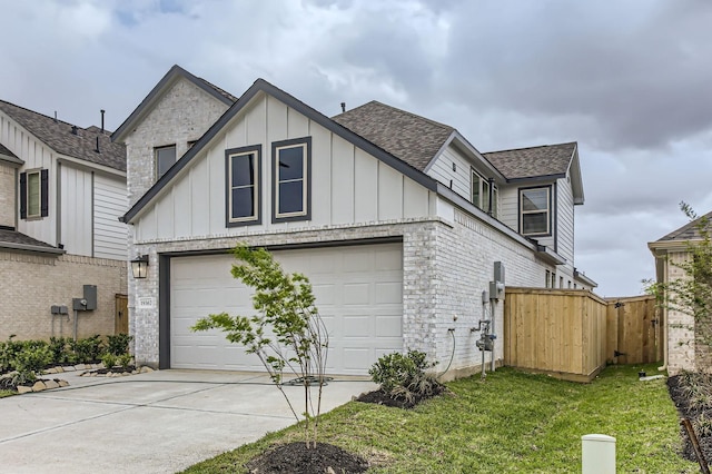 19367 Poppy Village Cir, Magnolia, TX 77355 - view of side of home featuring roof with shingles, driveway, and board and batten siding