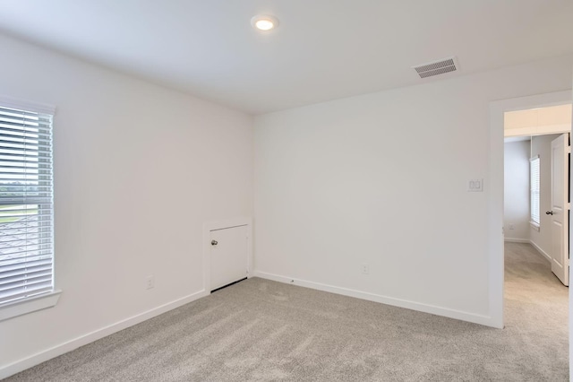 19367 Poppy Village Cir, Magnolia, TX 77355 - empty room with light colored carpet and recessed lighting