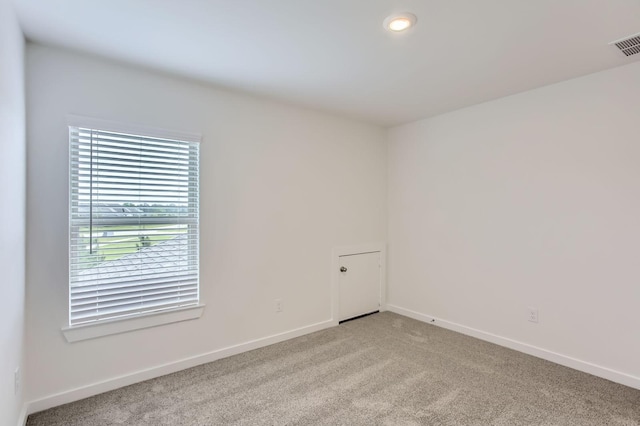 19367 Poppy Village Cir, Magnolia, TX 77355 - empty room featuring light carpet and recessed lighting