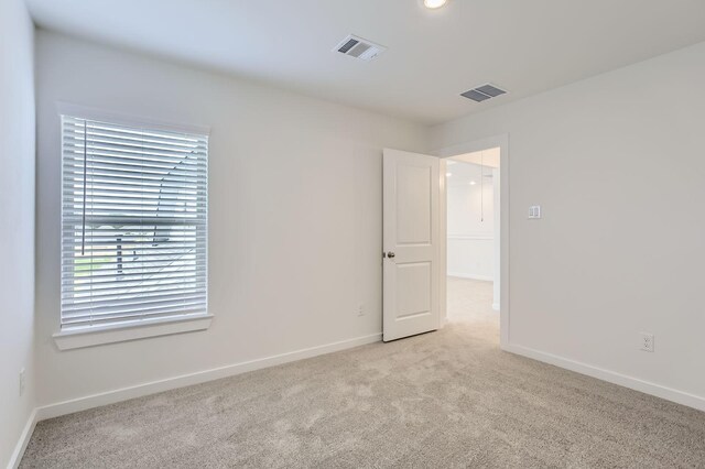 19367 Poppy Village Cir, Magnolia, TX 77355 - unfurnished room featuring light carpet and baseboards