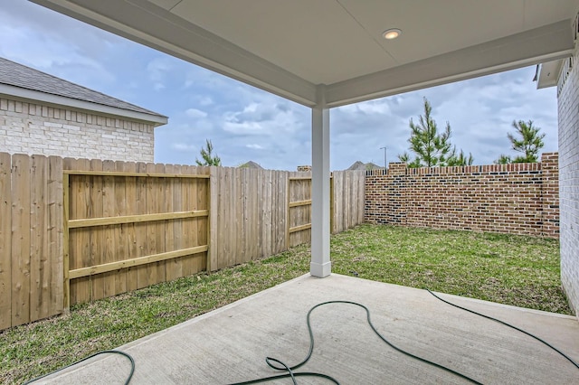 19367 Poppy Village Cir, Magnolia, TX 77355 - fenced backyard with a patio area