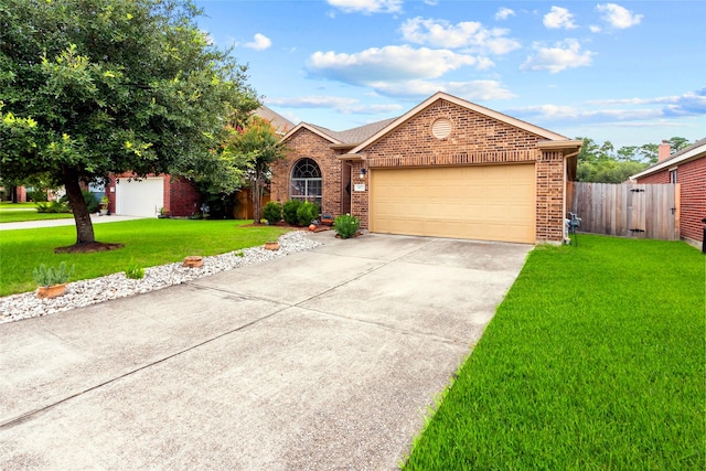 423 Carson Ridge Dr, Spring, TX 77386 - view of front of property with brick siding, concrete driveway, and a garage