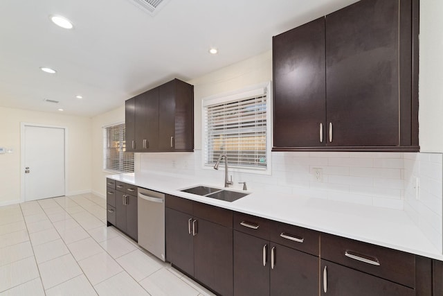 6234 Shadow Crest St, Houston, TX 77074 - kitchen featuring stainless steel dishwasher, tasteful backsplash, light countertops, dark brown cabinetry, and recessed lighting