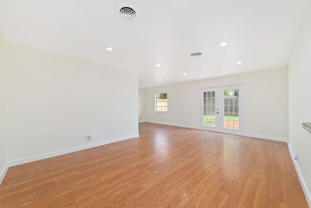 6234 Shadow Crest St, Houston, TX 77074 - unfurnished room with french doors, light wood-style floors, and recessed lighting