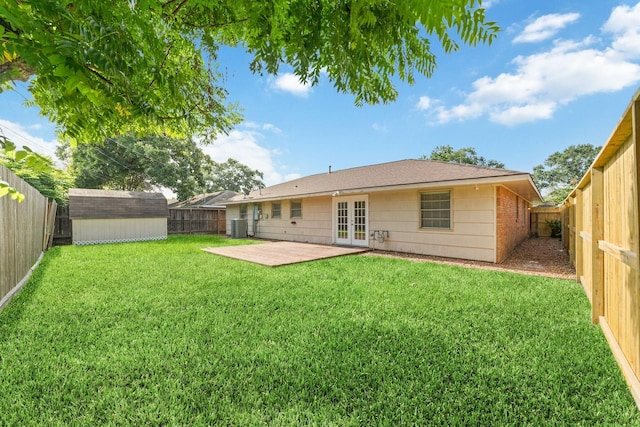 6234 Shadow Crest St, Houston, TX 77074 - rear view of house featuring french doors, a patio, and a fenced backyard