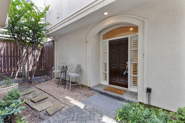 1908 Greenwich Place Dr, Houston, TX 77019 - doorway to property featuring stucco siding