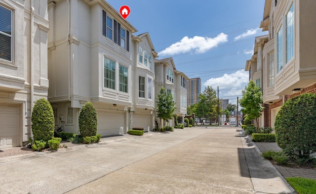 1908 Greenwich Place Dr, Houston, TX 77019 - view of concrete road featuring a residential view