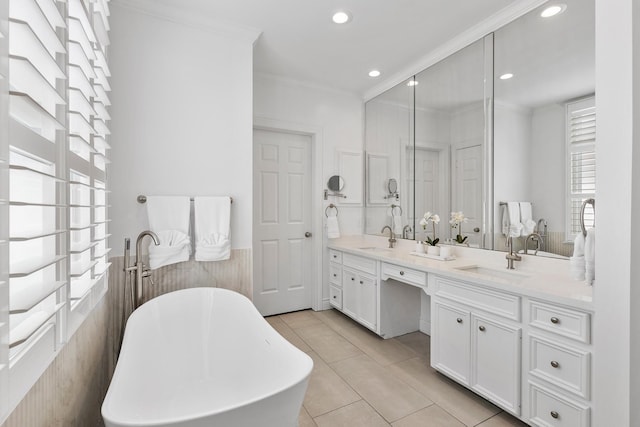 1908 Greenwich Place Dr, Houston, TX 77019 - full bath featuring a soaking tub, double vanity, recessed lighting, ornamental molding, and tile patterned floors