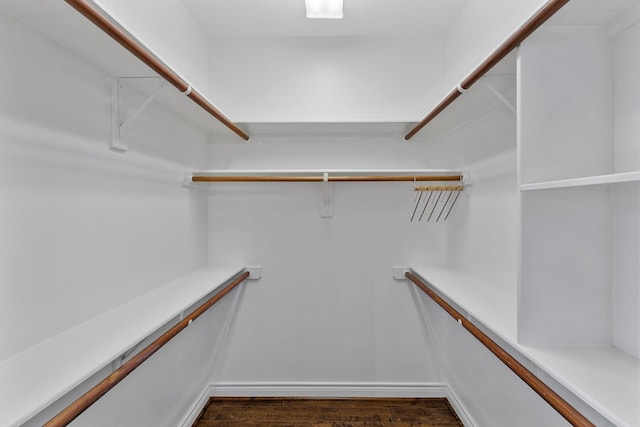 1908 Greenwich Place Dr, Houston, TX 77019 - walk in closet featuring wood finished floors