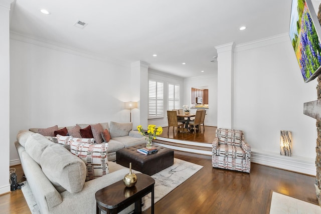 1908 Greenwich Place Dr, Houston, TX 77019 - living room with wood finished floors, ornamental molding, and recessed lighting