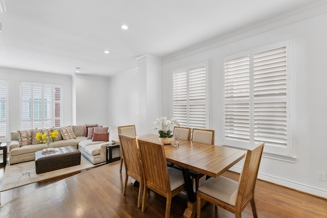 1908 Greenwich Place Dr, Houston, TX 77019 - dining space with crown molding, wood finished floors, and recessed lighting