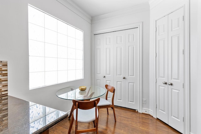 1908 Greenwich Place Dr, Houston, TX 77019 - dining space featuring wood finished floors and crown molding
