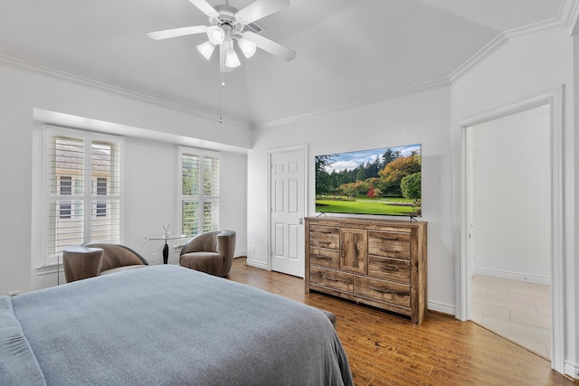 1908 Greenwich Place Dr, Houston, TX 77019 - bedroom featuring ornamental molding, vaulted ceiling, wood finished floors, and ceiling fan