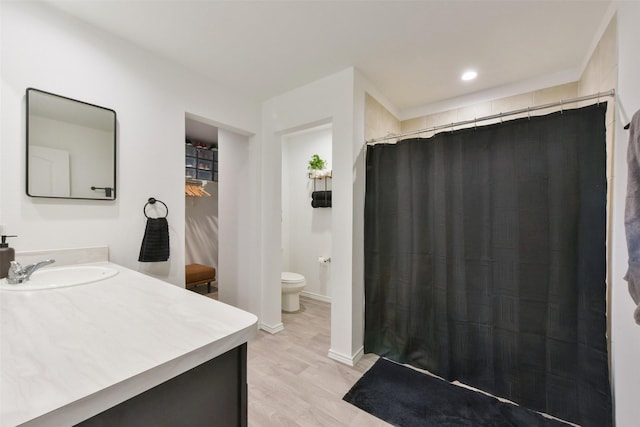 14417 Gray Rocks Rd, Splendora, TX 77372 - full bath featuring vanity, wood finished floors, and a shower with shower curtain