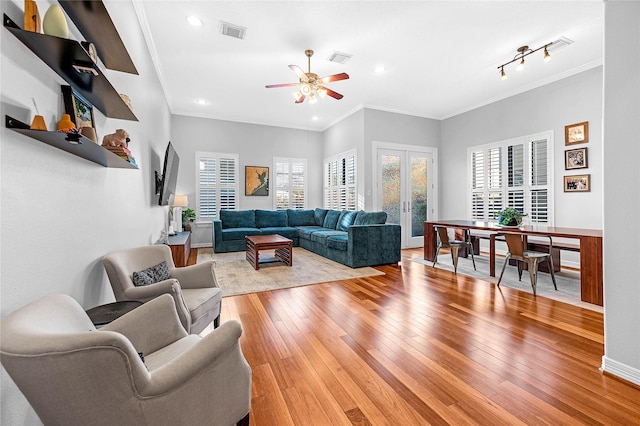 2043 W 14th 1/2 St, Houston, TX 77008 - living room with french doors, crown molding, light wood-style floors, ceiling fan, and recessed lighting
