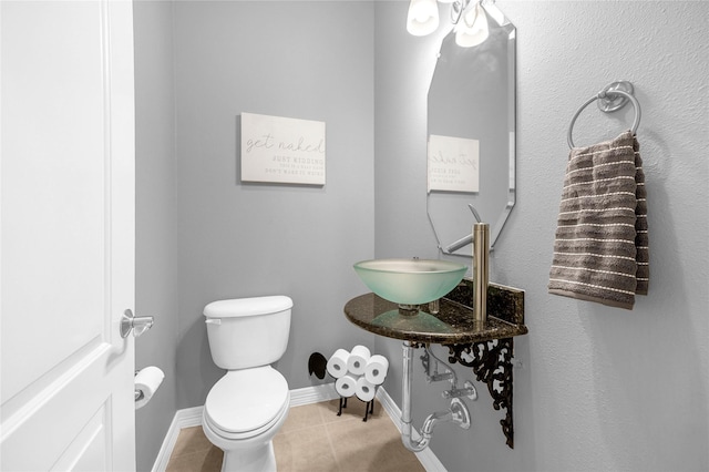 2043 W 14th 1/2 St, Houston, TX 77008 - bathroom featuring toilet and tile patterned flooring