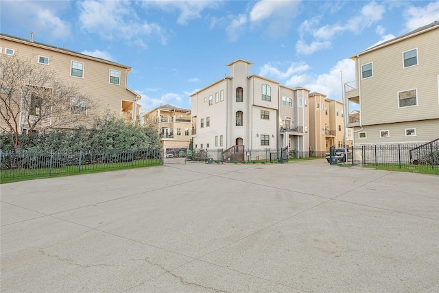 2043 W 14th 1/2 St, Houston, TX 77008 - view of concrete driveway featuring a residential view