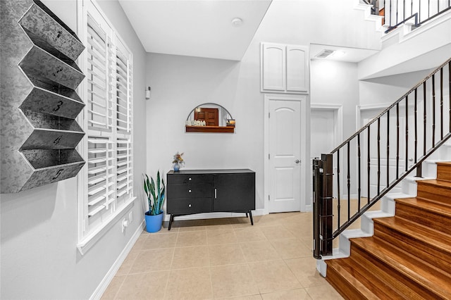 2043 W 14th 1/2 St, Houston, TX 77008 - foyer entrance with light tile patterned flooring and stairway