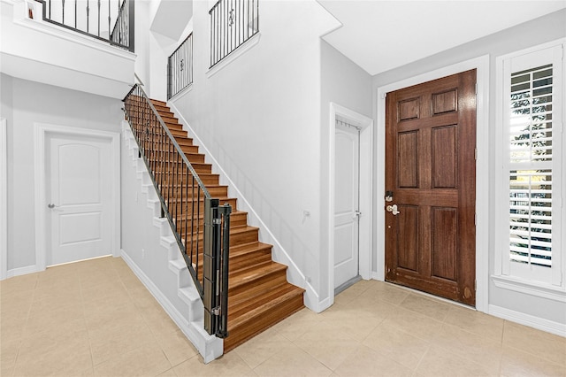 2043 W 14th 1/2 St, Houston, TX 77008 - foyer featuring stairs and light tile patterned floors